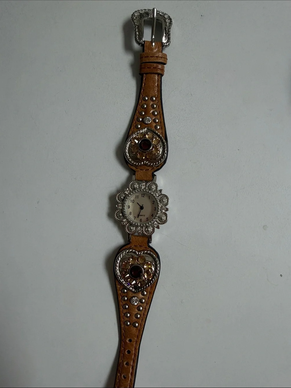 Source Unknown Brown Leather Wristwatch  Silver-Tone Floral Bezel needs battery